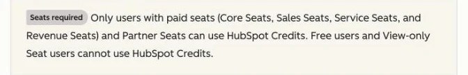 A callout in HubSpot&rsquo;s documentation labelled &ldquo;Seats required&rdquo;, stating that only users with paid seats and Partner Seats can use HubSpot Credits and that free and View-only Seat users cannot